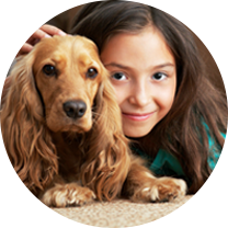 Girl and Dog on Carpet | Carpet Stretching Services in Lowndes County, GA